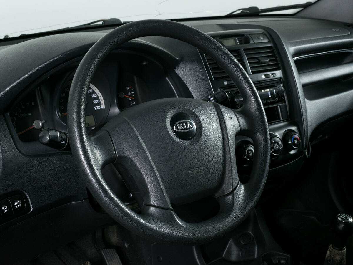 Kia Sportage с пробегом — 2007 год. Фото: #11