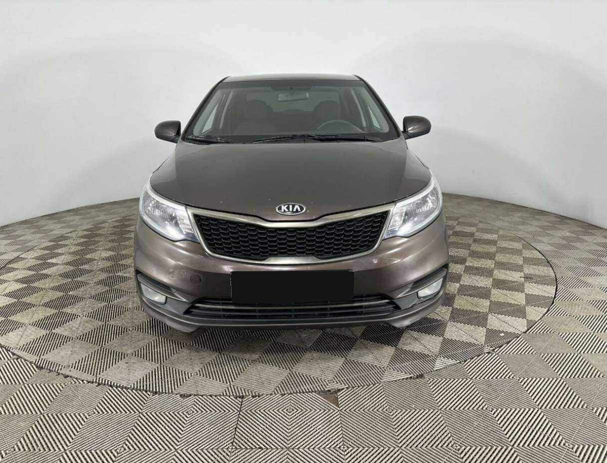 Kia Rio с пробегом — 2015 год. Фото: #1