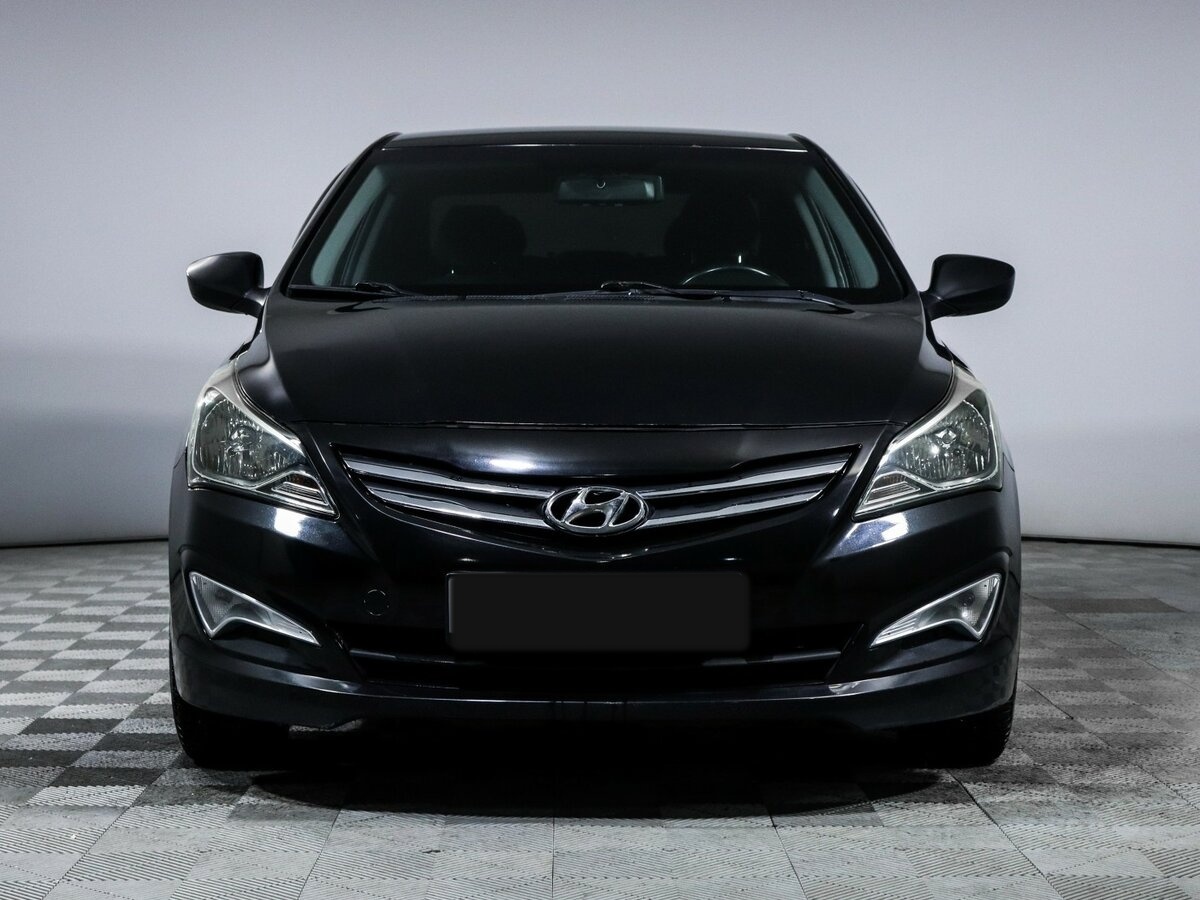 Hyundai Solaris с пробегом — 2015 год. Фото: #1