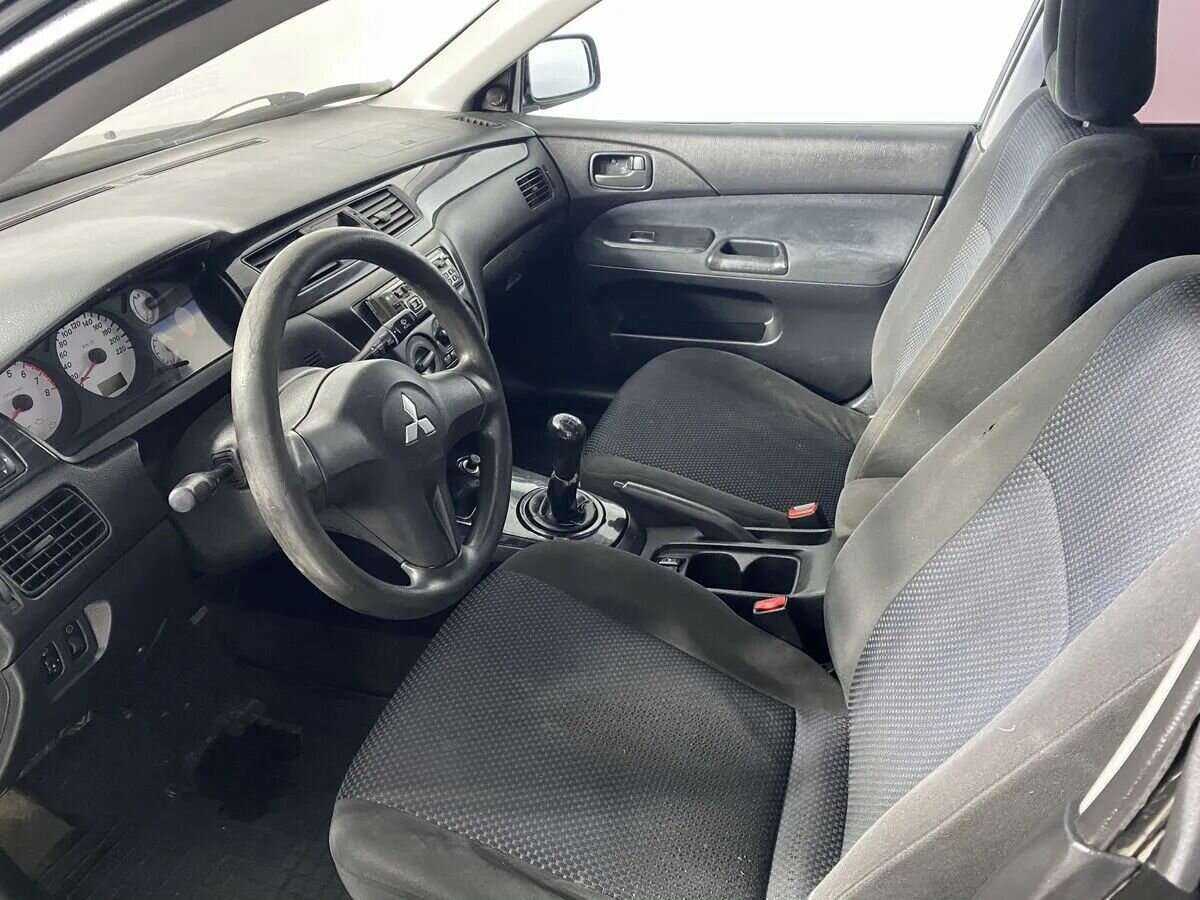 Mitsubishi Lancer с пробегом — 2006 год. Фото: #7