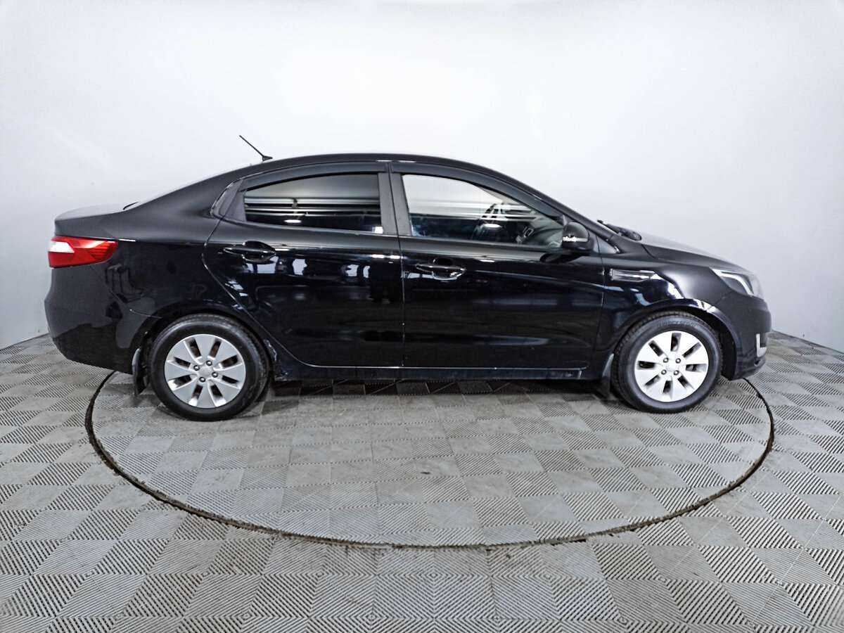 Kia Rio с пробегом — 2011 год. Фото: #3