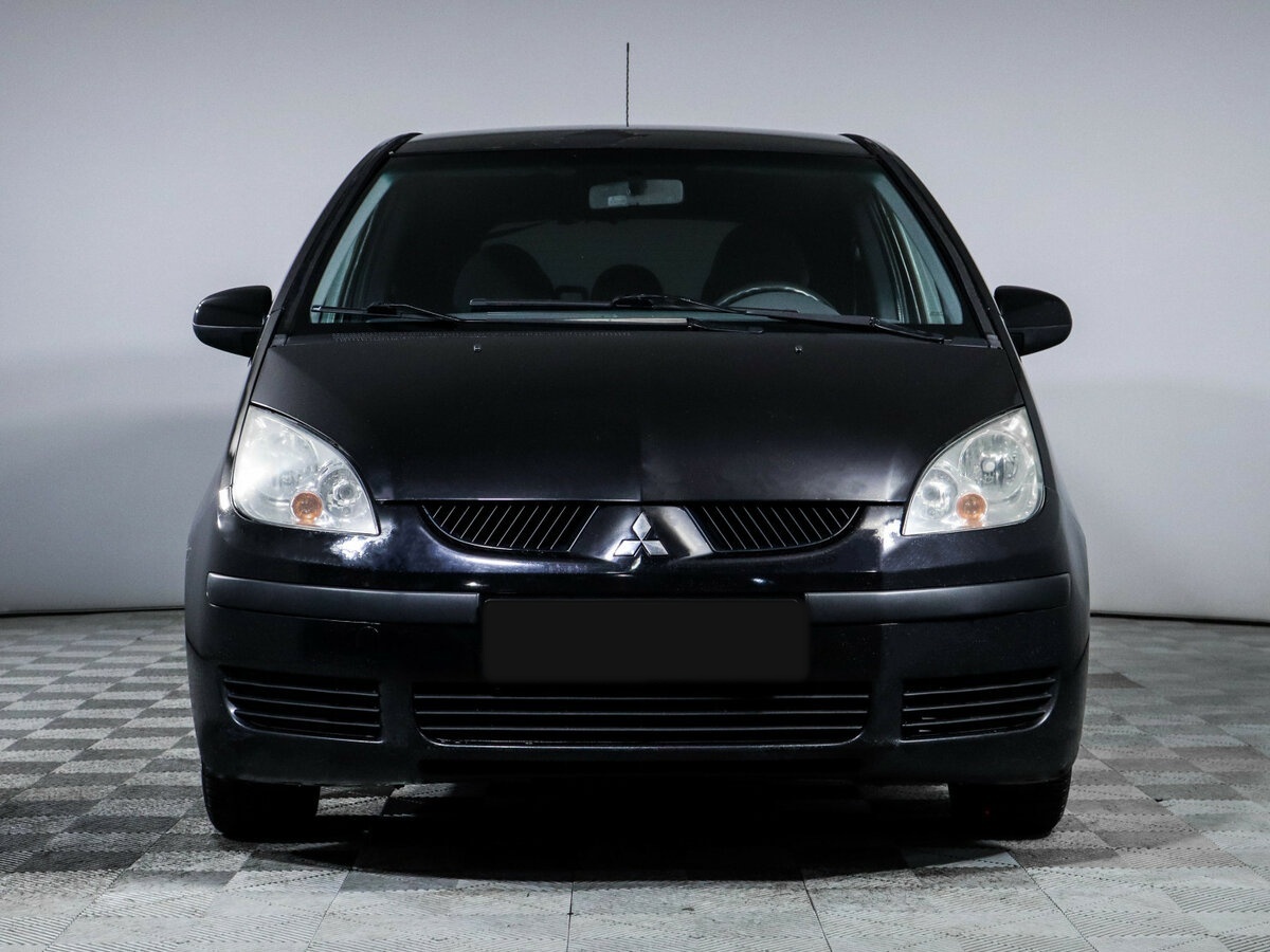 Mitsubishi Colt с пробегом — 2006 год. Фото: #1
