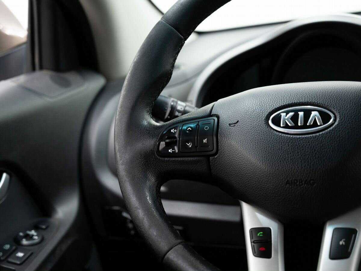 Kia Sportage с пробегом — 2011 год. Фото: #12