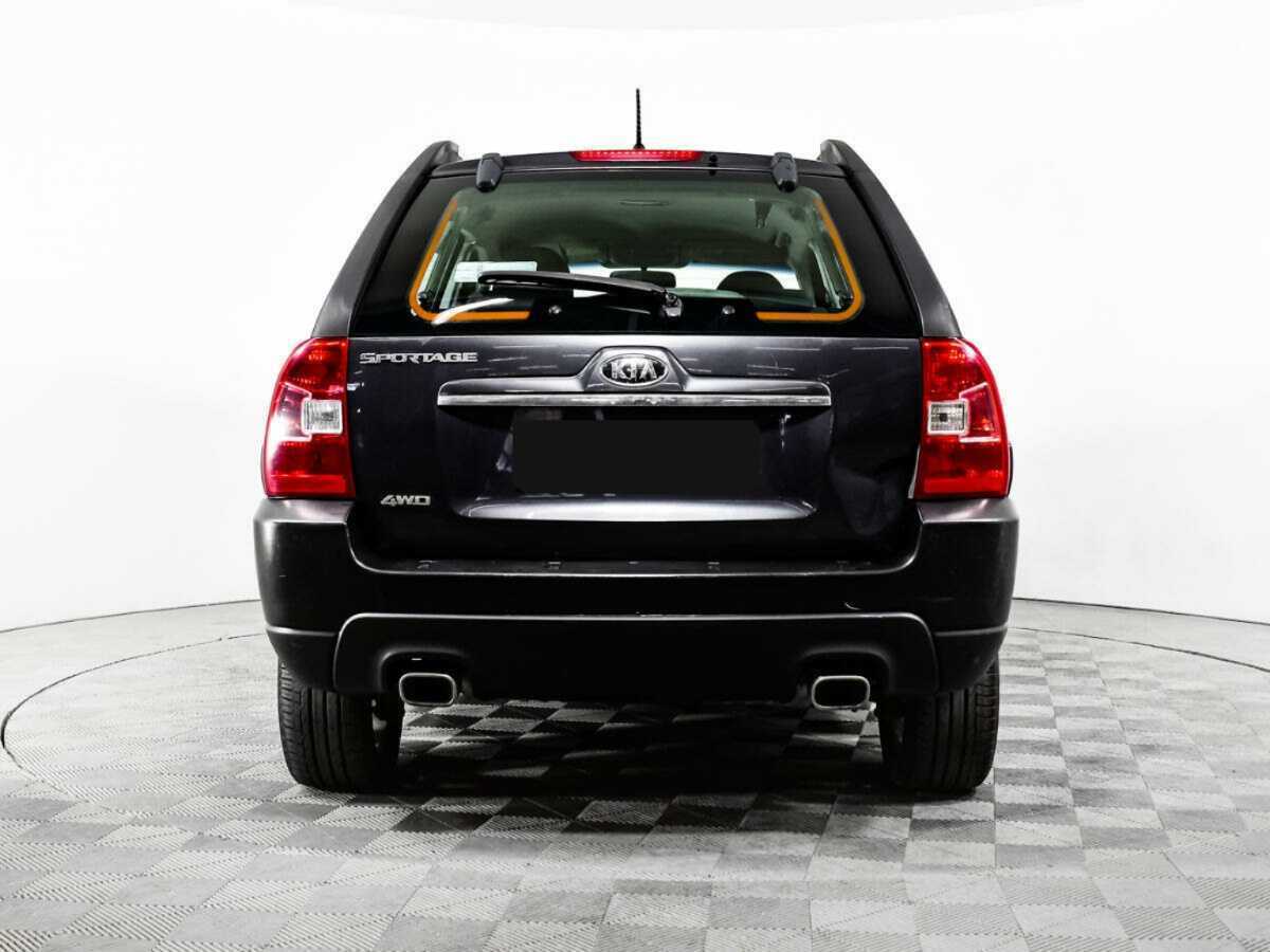 Kia Sportage с пробегом — 2010 год. Фото: #4