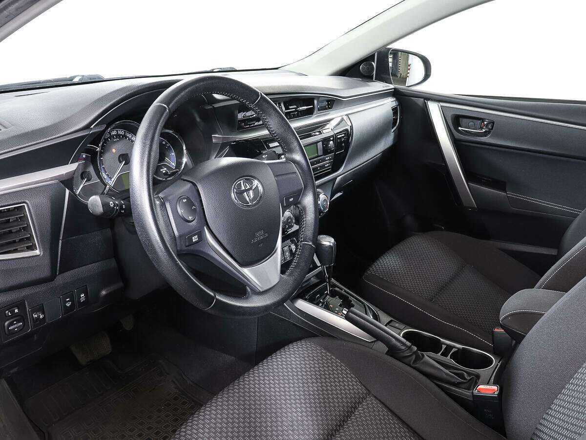 Toyota Corolla с пробегом — 2013 год. Фото: #11