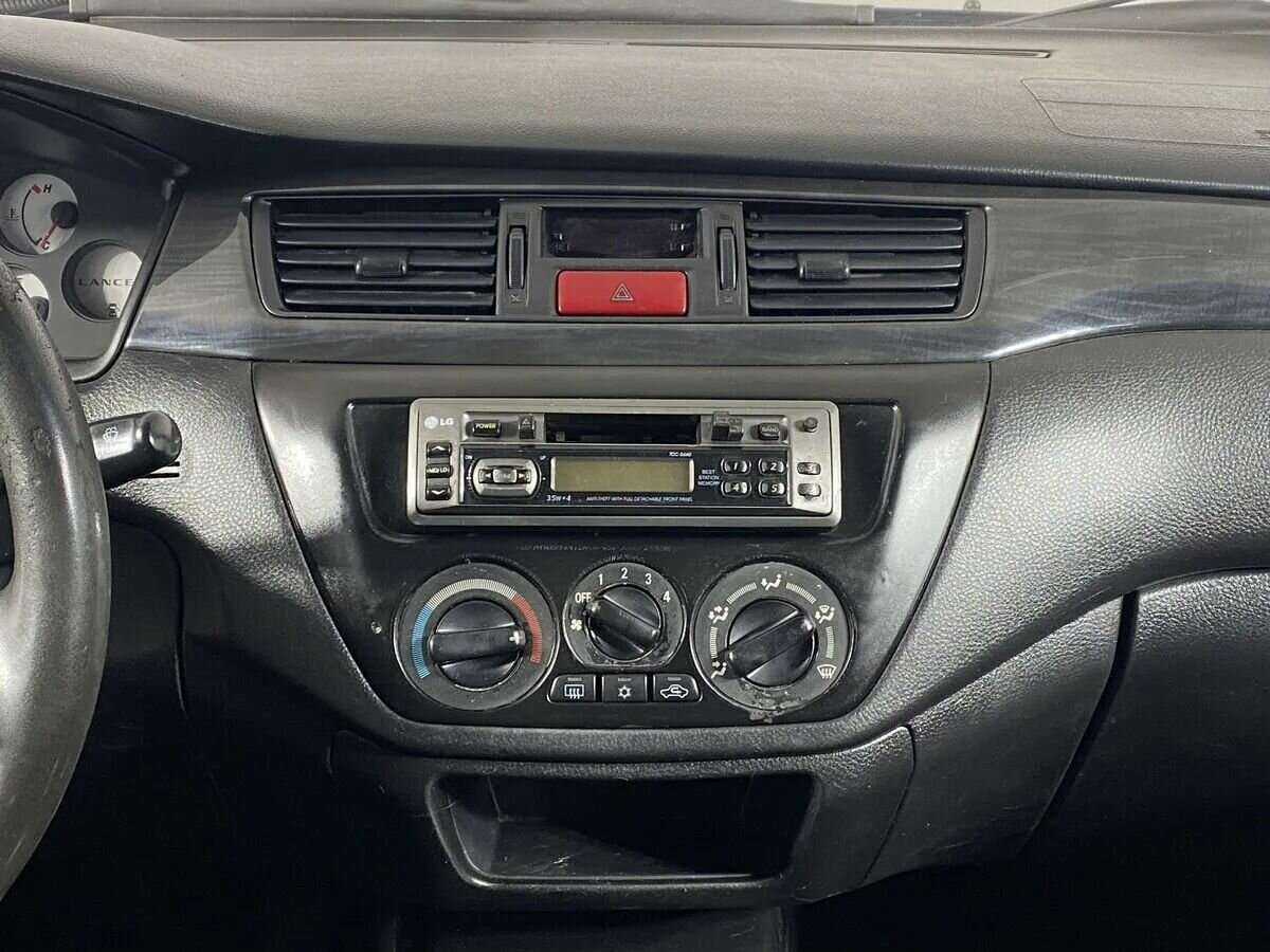 Mitsubishi Lancer с пробегом — 2006 год. Фото: #11