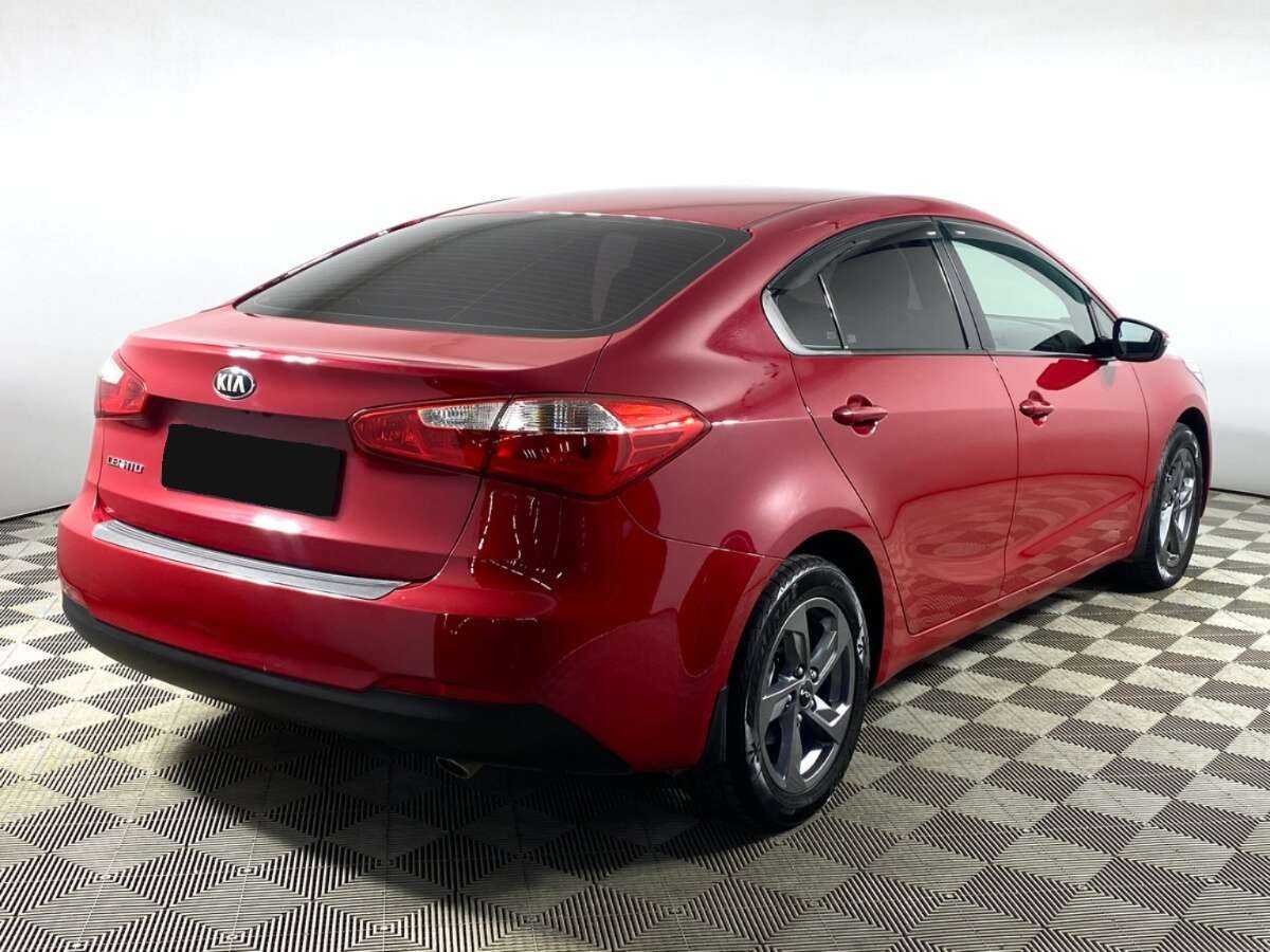 Kia Cerato с пробегом — 2013 год. Фото: #3