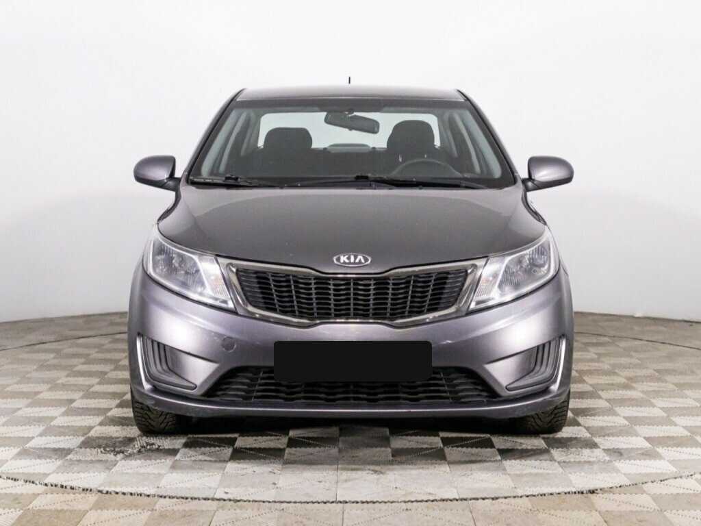 Kia Rio с пробегом — 2013 год. Фото: #1