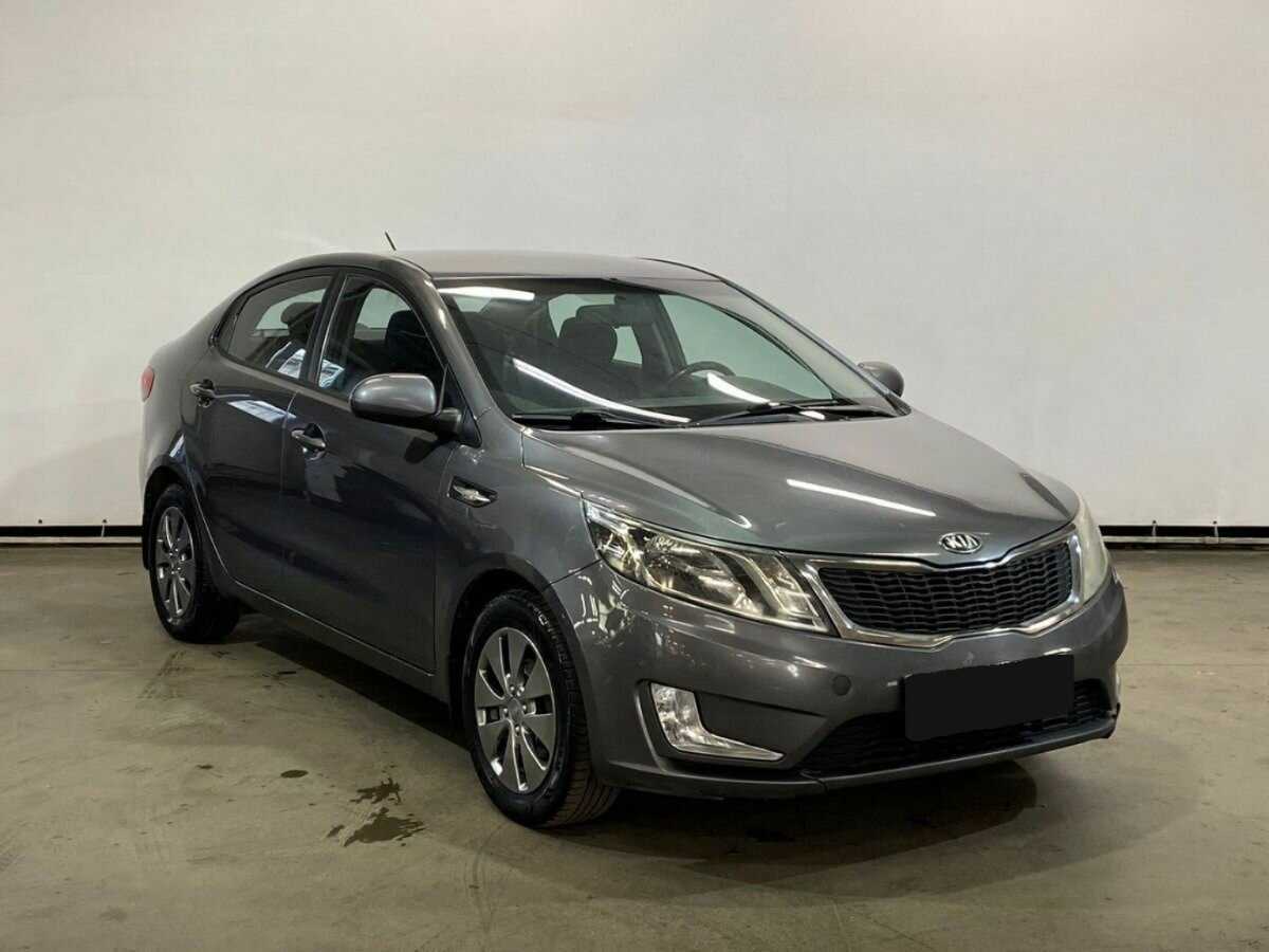 Kia Rio с пробегом — 2014 год. Фото: #2
