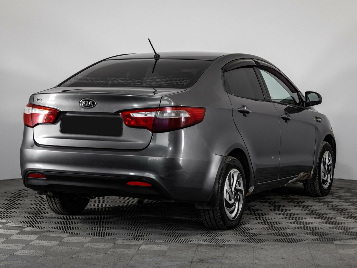Kia Rio с пробегом — 2011 год. Фото: #3