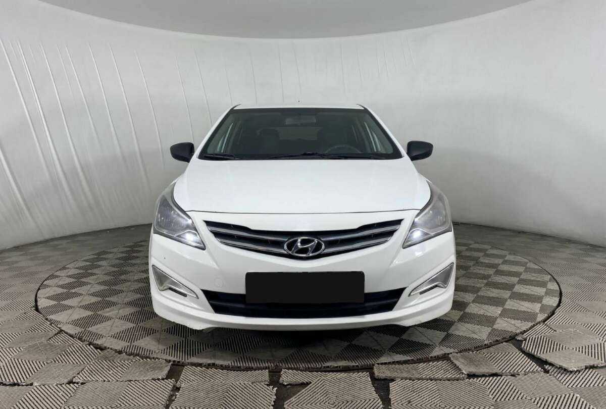 Hyundai Solaris с пробегом — 2014 год. Фото: #1