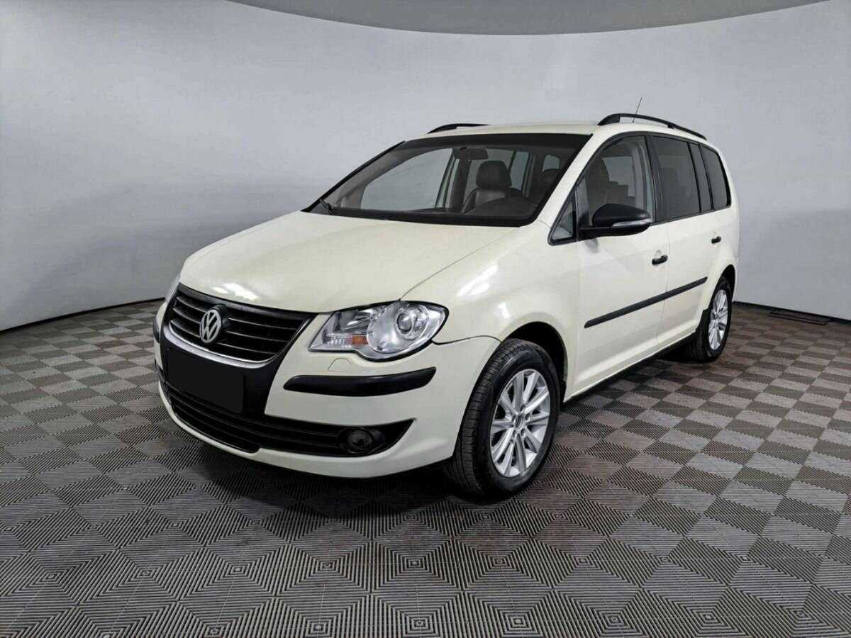 Volkswagen Touran с пробегом — 2010 год. Посмотреть фото