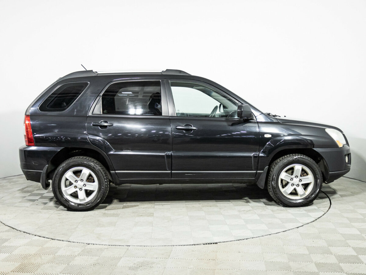 Kia Sportage с пробегом — 2009 год. Фото: #3