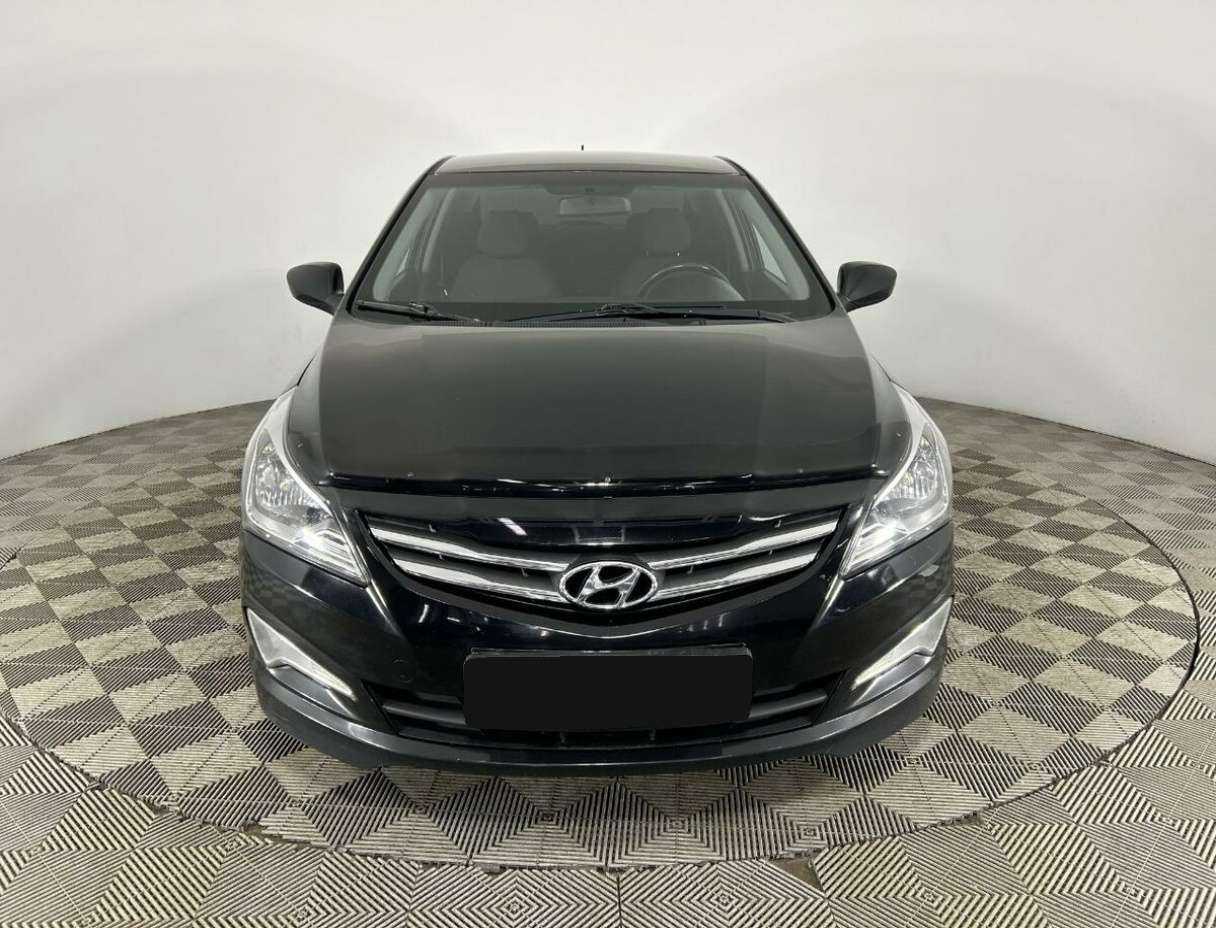 Hyundai Solaris с пробегом — 2015 год. Фото: #1