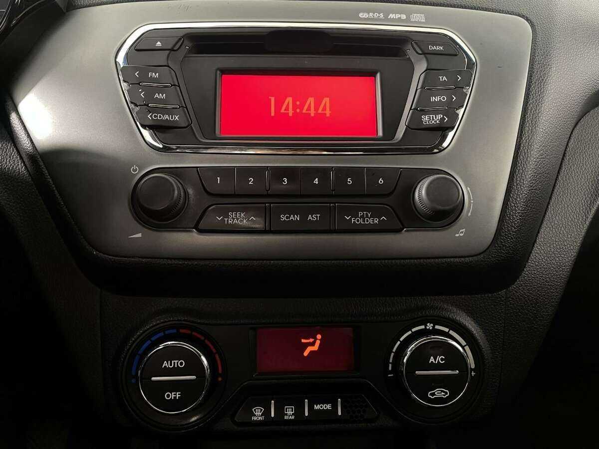 Kia Rio с пробегом — 2013 год. Фото: #11