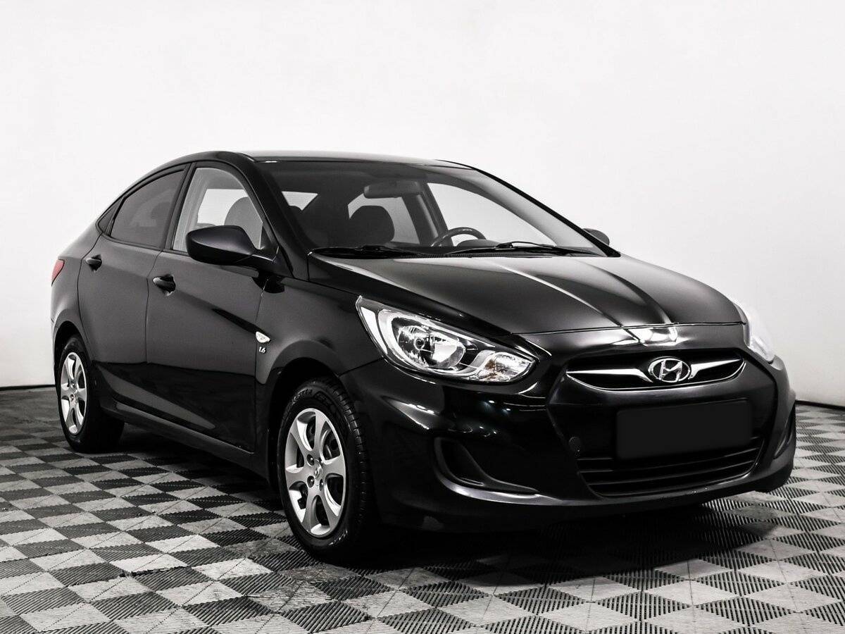 Hyundai Solaris с пробегом — 2012 год. Фото: #2