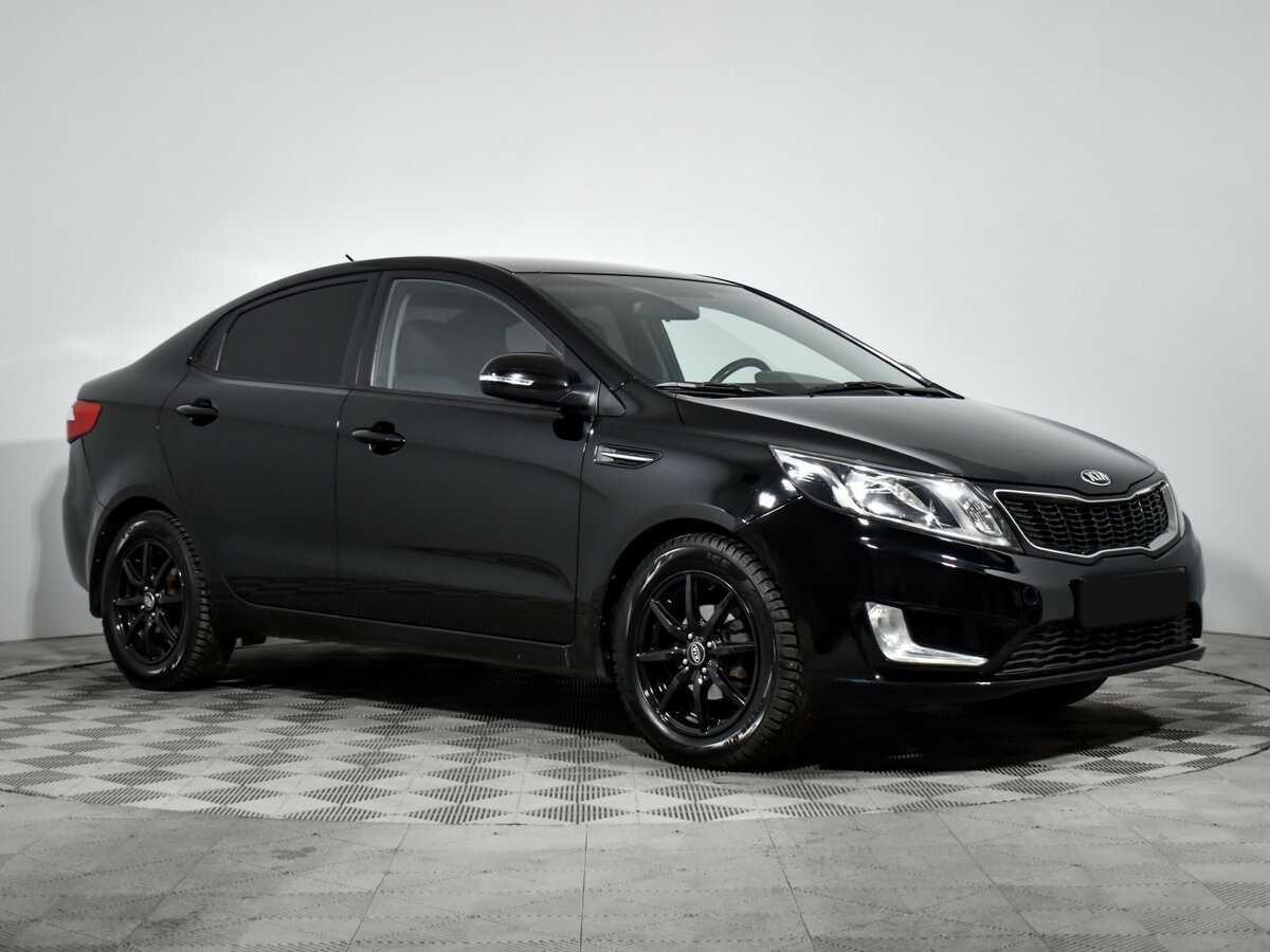 Kia Rio с пробегом — 2013 год. Фото: #2