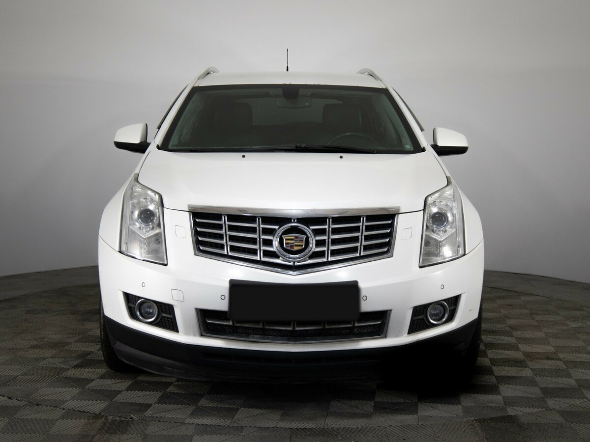 Cadillac SRX с пробегом — 2013 год. Фото: #1