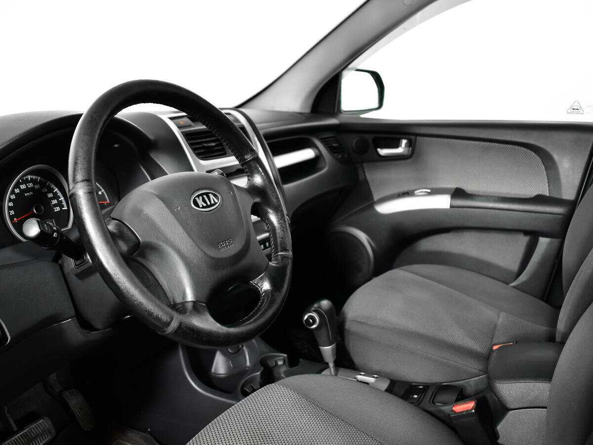 Kia Sportage с пробегом — 2010 год. Фото: #11