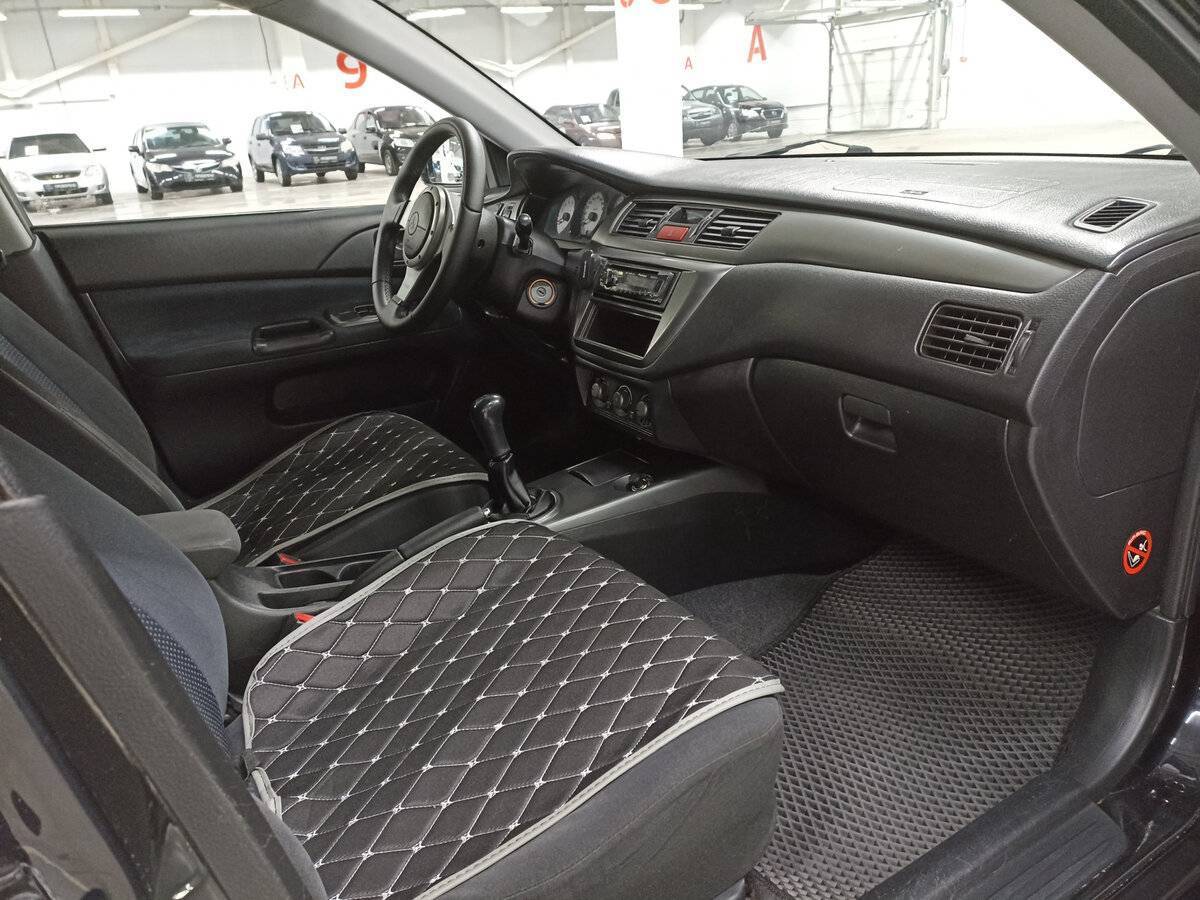 Mitsubishi Lancer с пробегом — 2006 год. Фото: #10