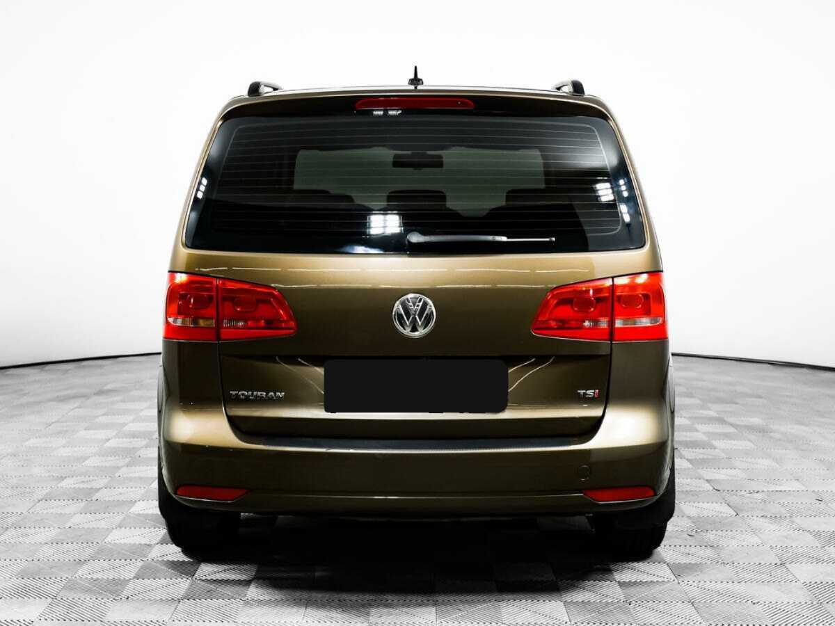 Volkswagen Touran с пробегом — 2013 год. Фото: #5