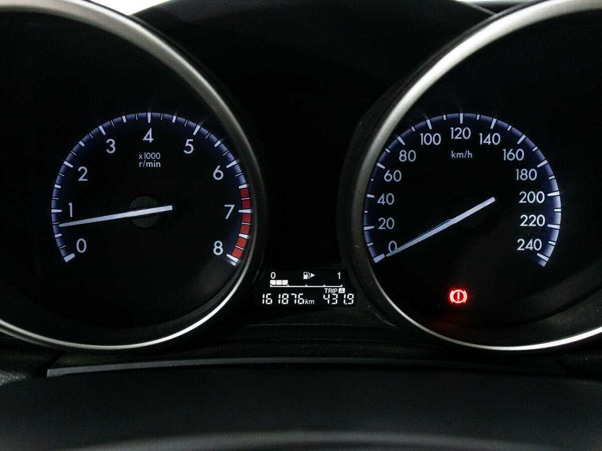 Mazda 3 с пробегом — 2011 год. Фото: #11
