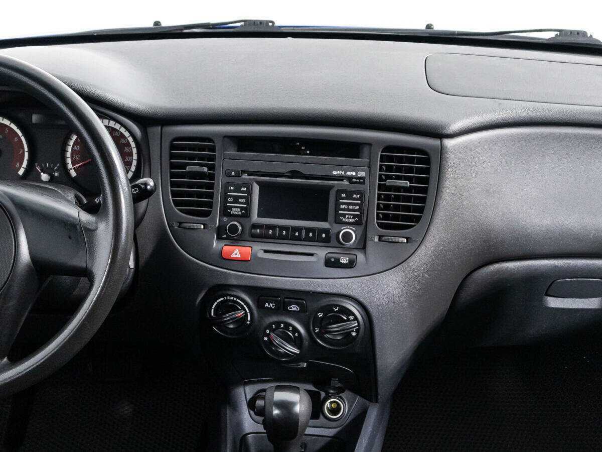 Kia Rio с пробегом — 2010 год. Фото: #13
