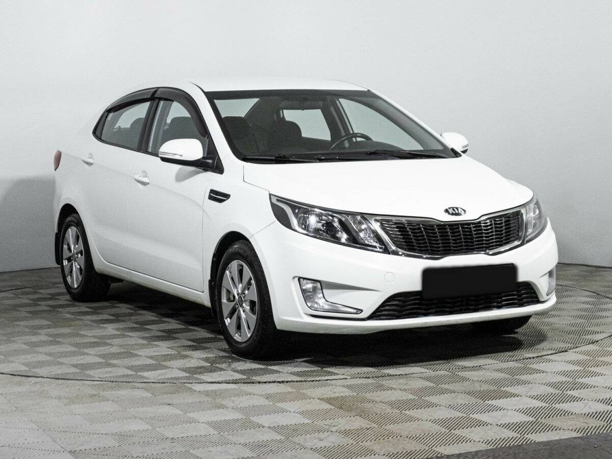 Kia Rio с пробегом — 2013 год. Фото: #2