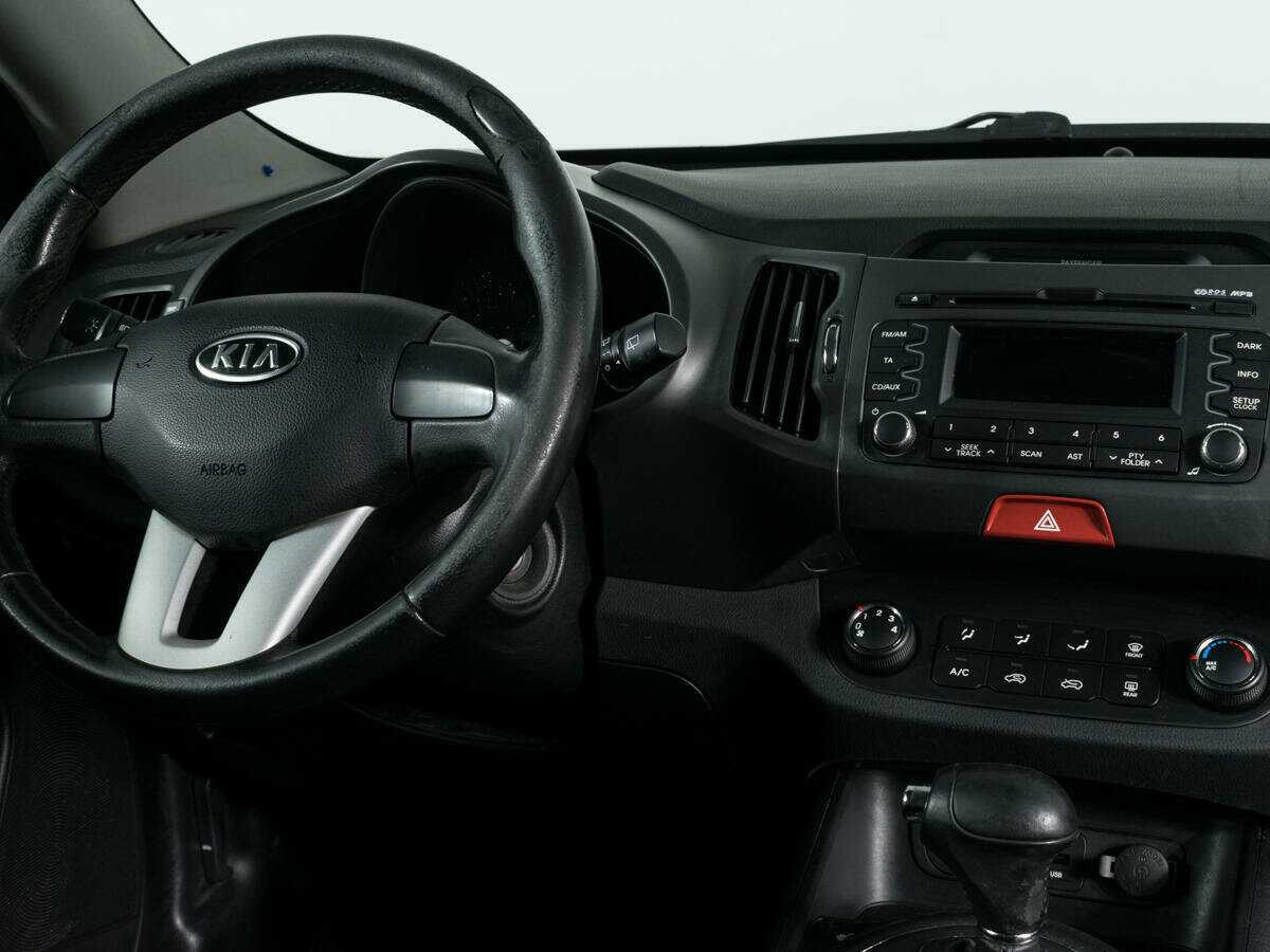 Kia Sportage с пробегом — 2010 год. Фото: #11
