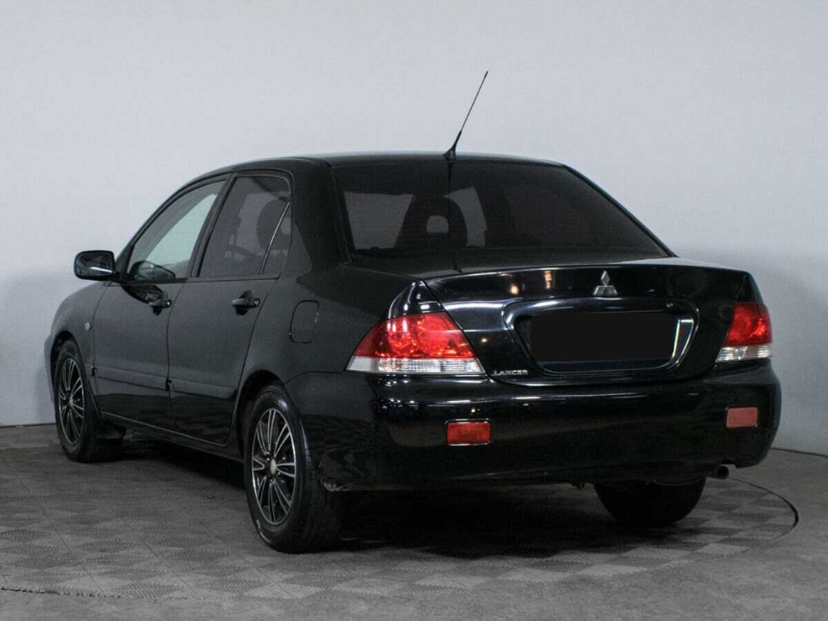 Mitsubishi Lancer с пробегом — 2009 год. Фото: #6