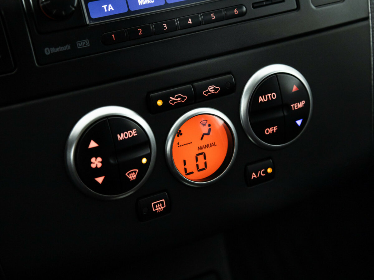Nissan Tiida с пробегом — 2010 год. Фото: #16