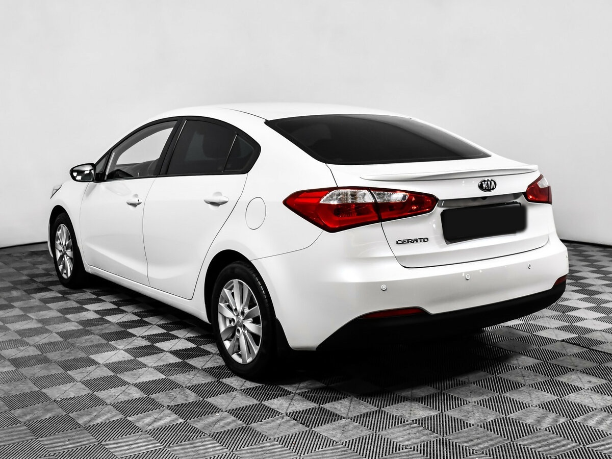 Kia Cerato с пробегом — 2013 год. Фото: #6