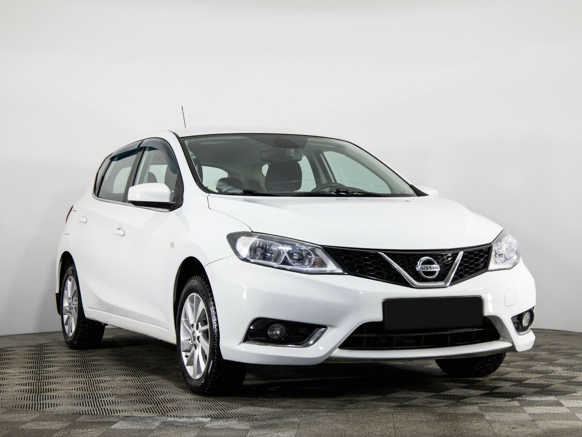 Nissan Tiida с пробегом — 2015 год. Фото: #2