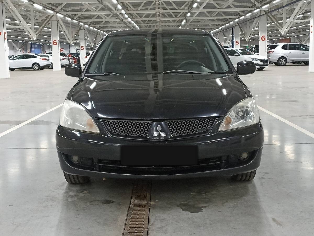 Mitsubishi Lancer с пробегом — 2006 год. Фото: #1