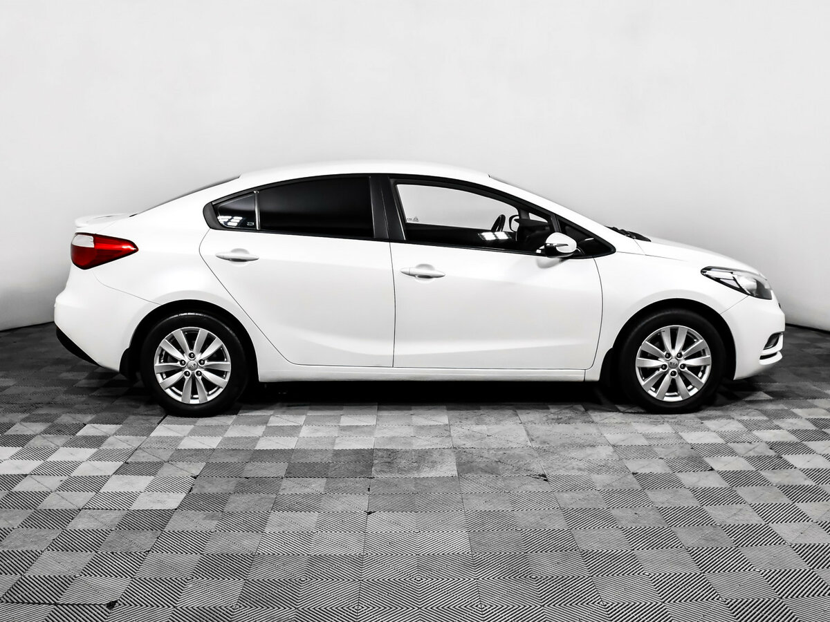 Kia Cerato с пробегом — 2013 год. Фото: #3