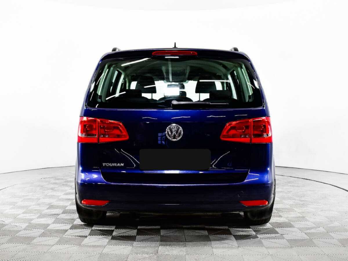 Volkswagen Touran с пробегом — 2012 год. Фото: #5