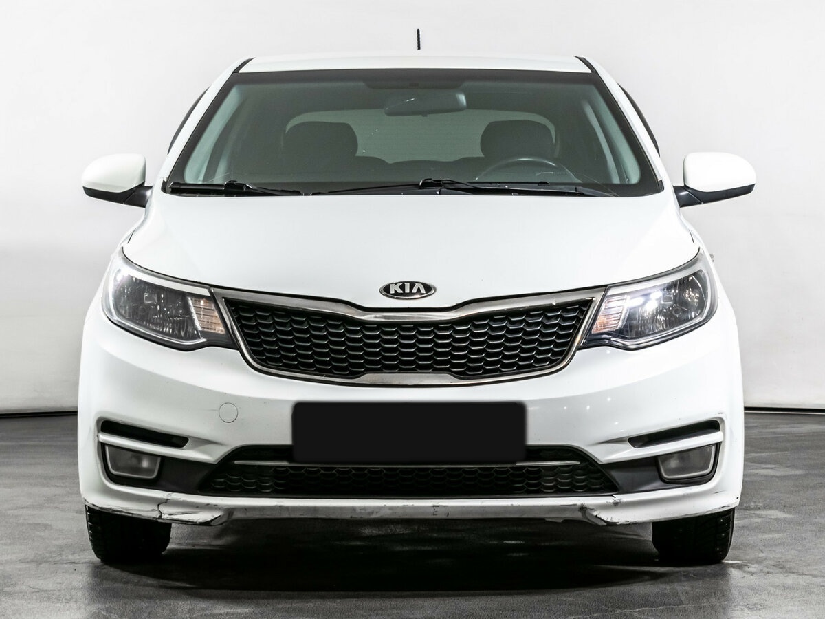 Kia Rio с пробегом — 2015 год. Фото: #1