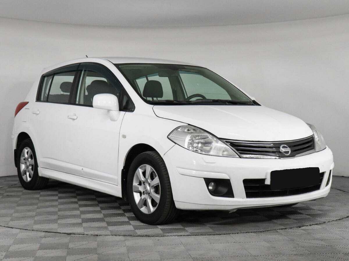 Nissan Tiida с пробегом — 2013 год. Фото: #2