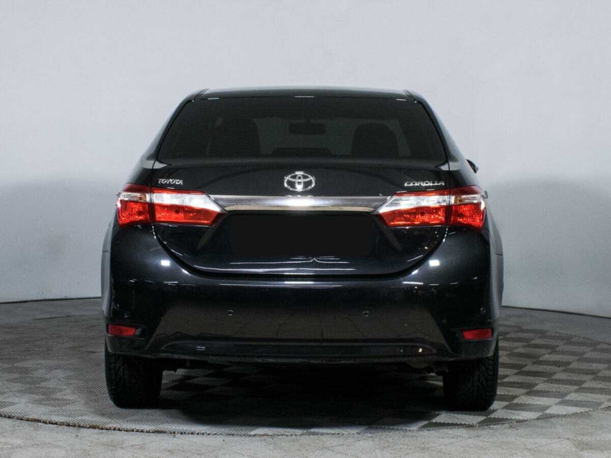 Toyota Corolla с пробегом — 2013 год. Фото: #5