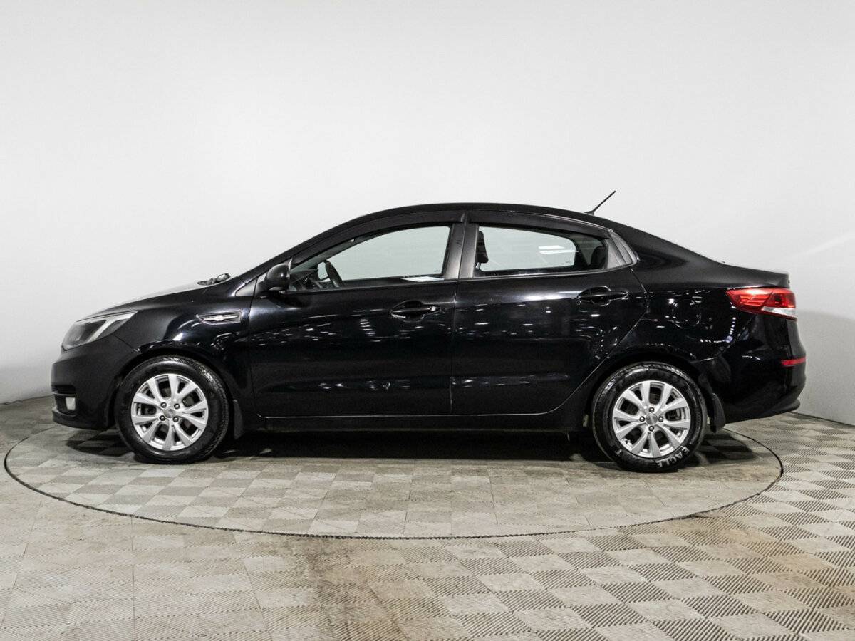 Kia Rio с пробегом — 2015 год. Фото: #7