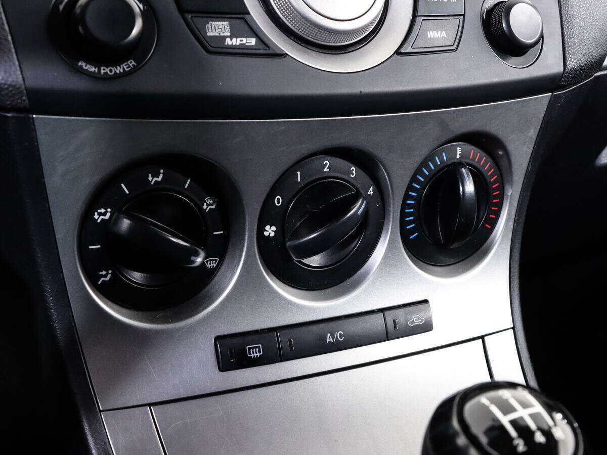 Mazda 3 с пробегом — 2010 год. Фото: #13