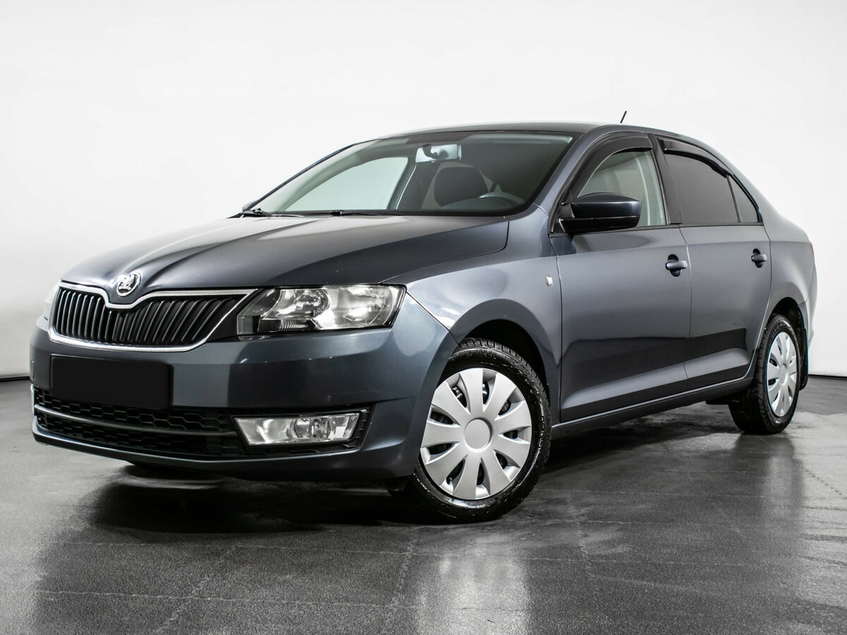 Skoda Rapid с пробегом — 2014 год. Посмотреть фото