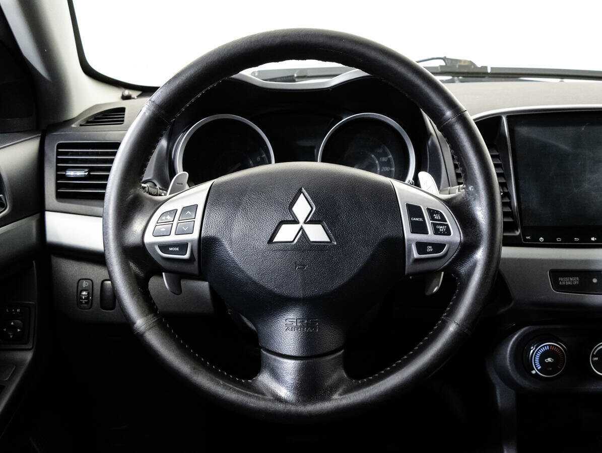 Mitsubishi Lancer с пробегом — 2011 год. Фото: #11