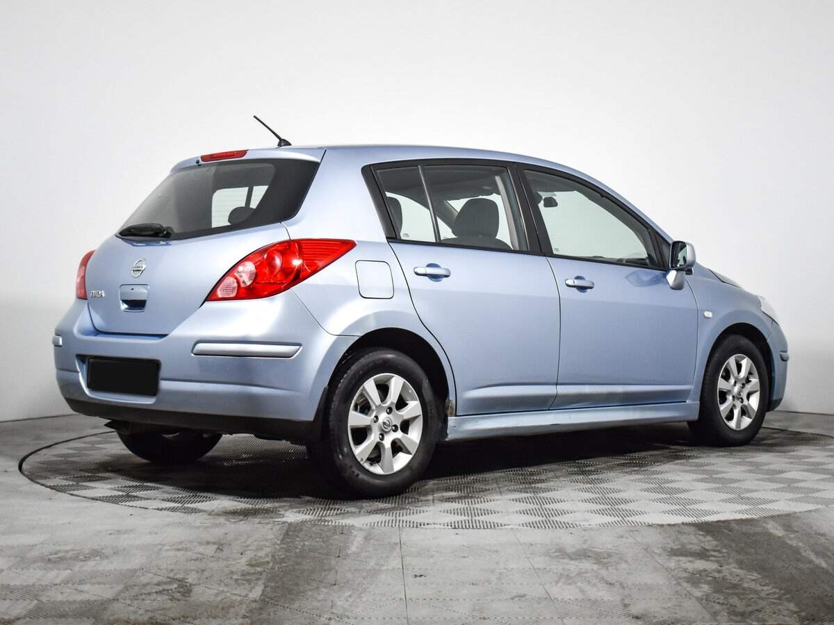 Nissan Tiida с пробегом — 2010 год. Фото: #4