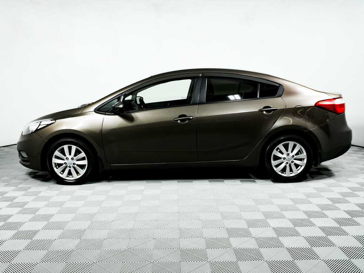 Kia Cerato с пробегом — 2014 год. Фото: #7