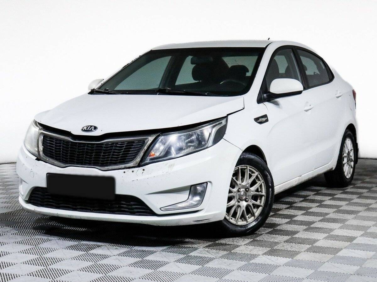 Kia Rio с пробегом — 2013 год. Посмотреть фото