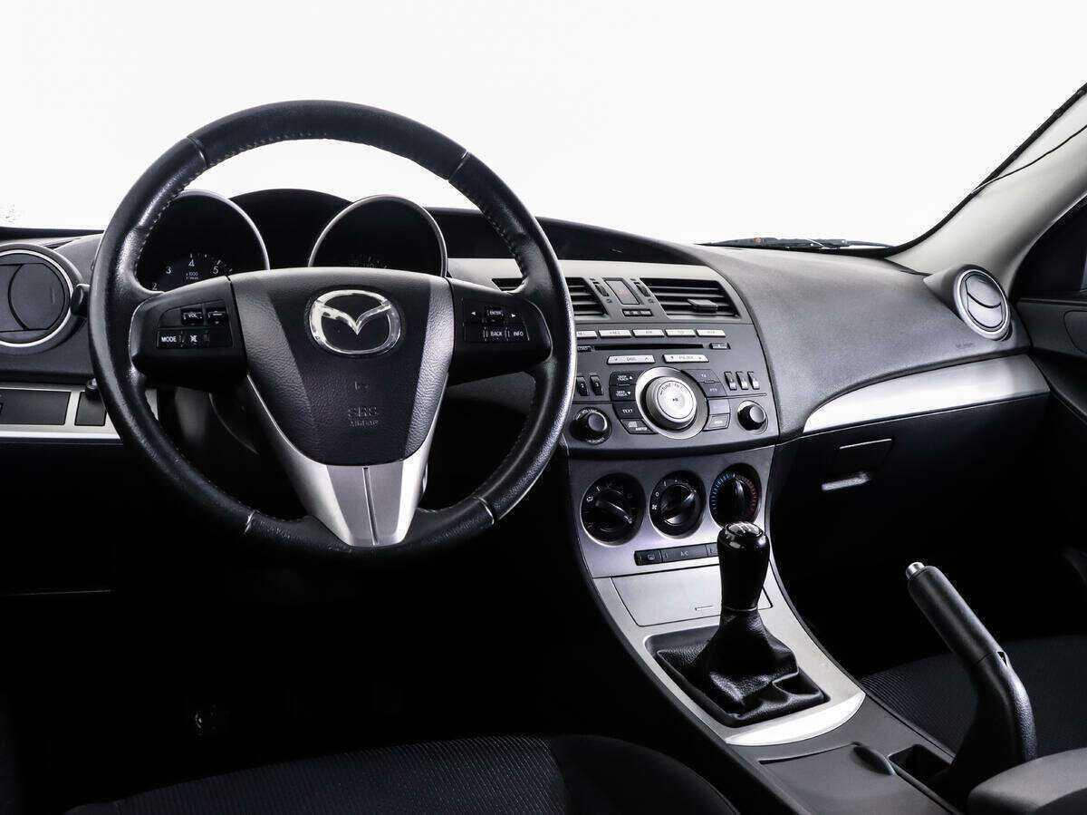 Mazda 3 с пробегом — 2010 год. Фото: #10