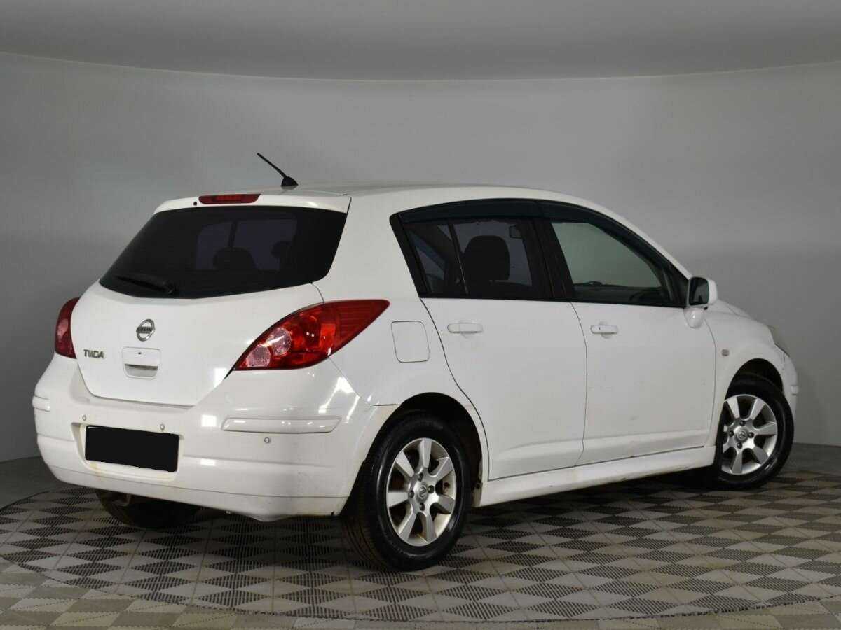 Nissan Tiida с пробегом — 2011 год. Фото: #1