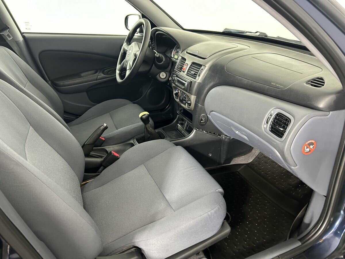 Nissan Almera с пробегом — 2005 год. Фото: #13