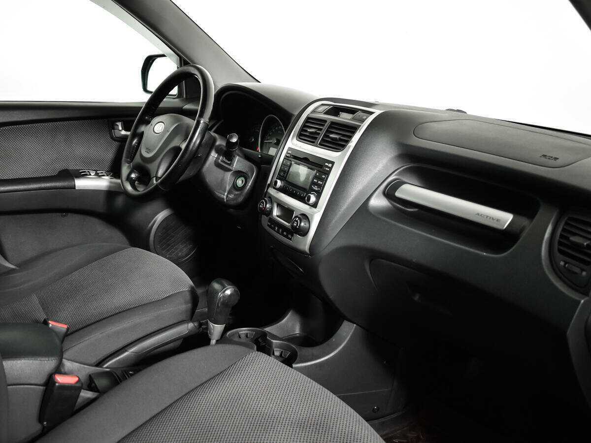 Kia Sportage с пробегом — 2010 год. Фото: #7
